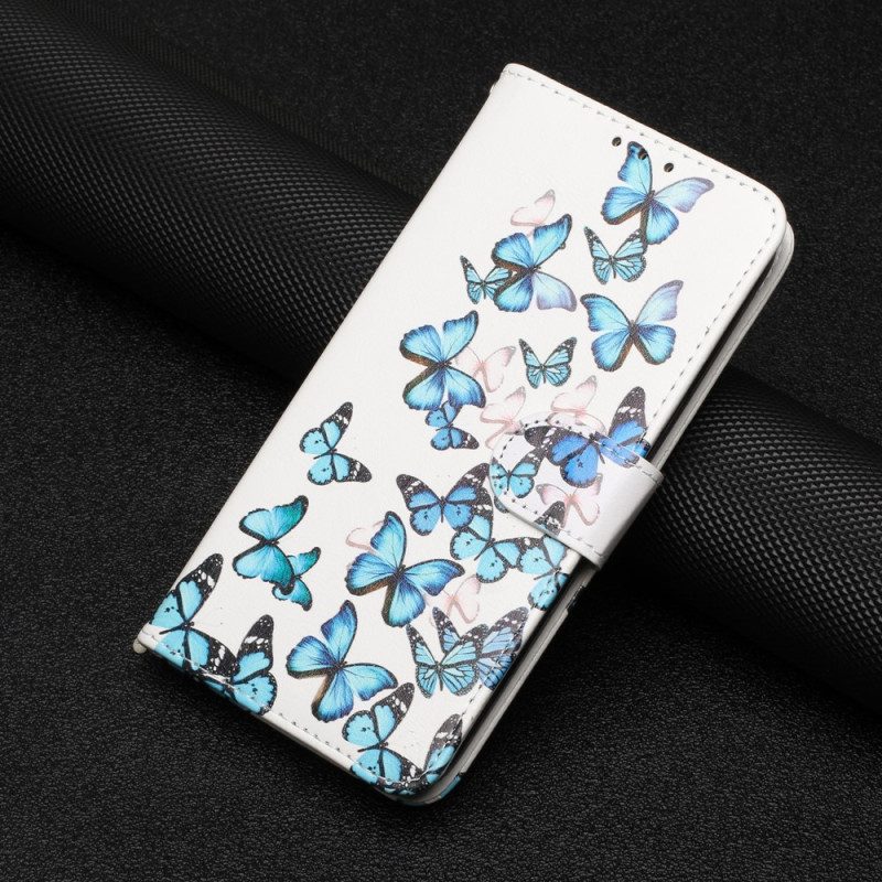 Flip Case voor Moto G73 5G Met Ketting Blauwe Vlinders In Riemvlucht