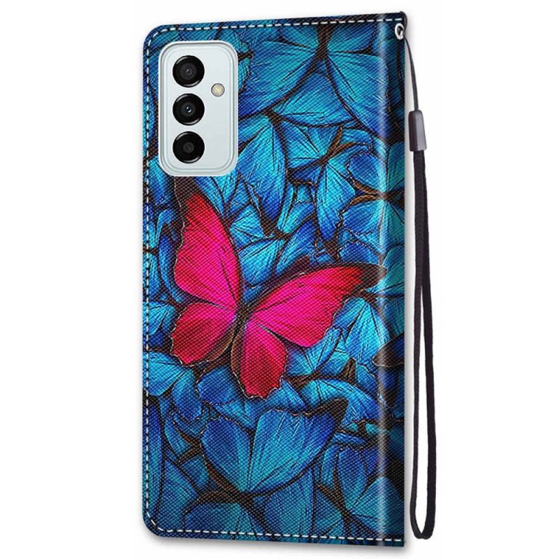 Leren Hoesje voor Samsung Galaxy M23 5G Rode Vlinder Blauwe Achtergrond