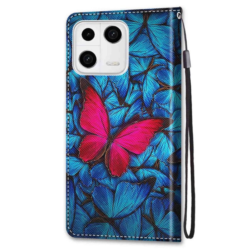 Folio-hoesje voor Xiaomi 13 Rode Vlinder Blauwe Achtergrond