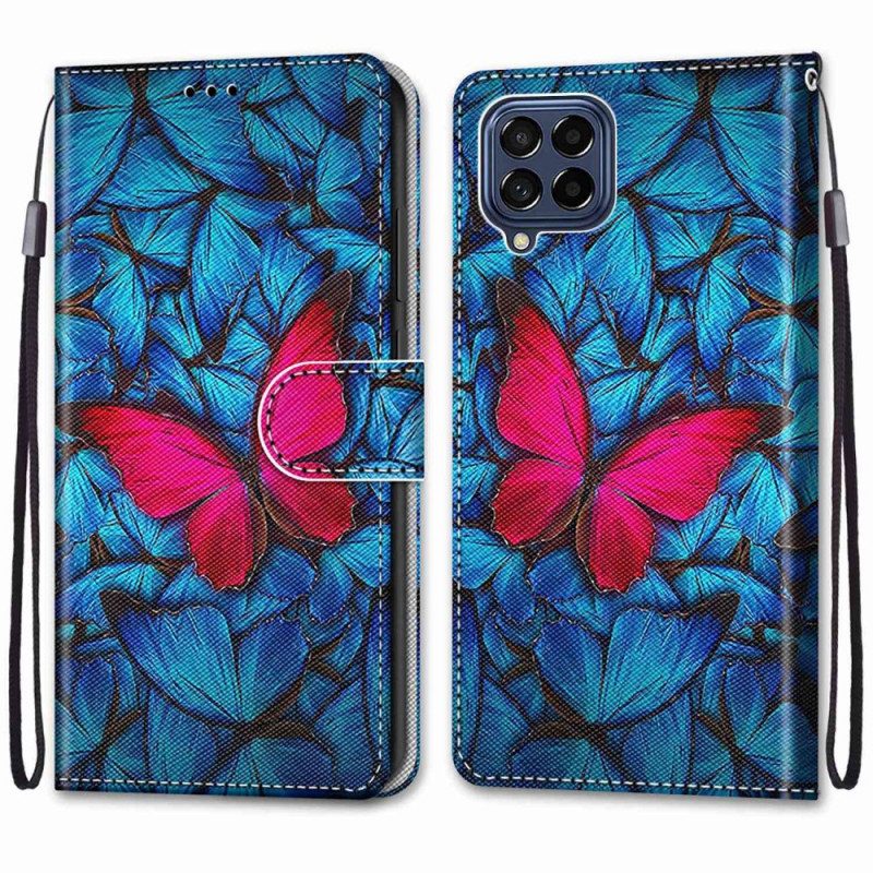 Folio-hoesje voor Samsung Galaxy M53 5G Rode Vlinder Blauwe Achtergrond