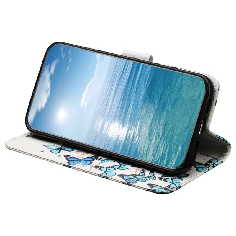 Folio-hoesje Poco C65 Telefoonhoesje Vlucht Blauwe Vlinders