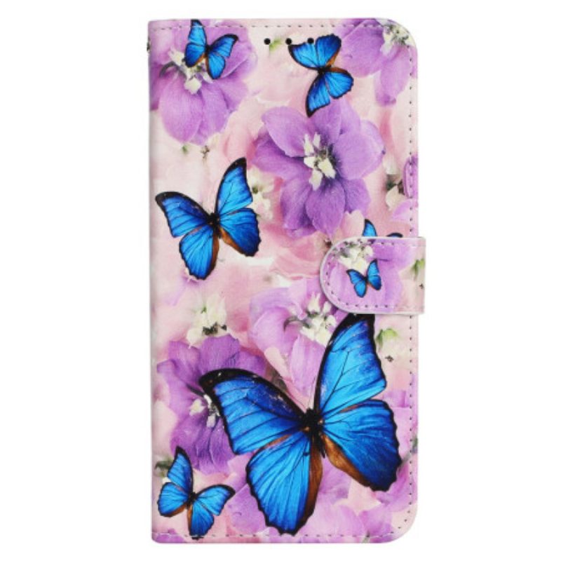 Folio-hoesje iPhone 16 Telefoonhoesje Blauwe Vlinders En Paarse Bloemen Met Riempje