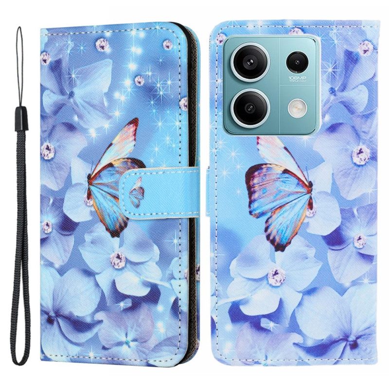 Flip Case Leren Xiaomi Redmi Note 13 5g Blauwe Bloemen En Vlinder Met Riempje