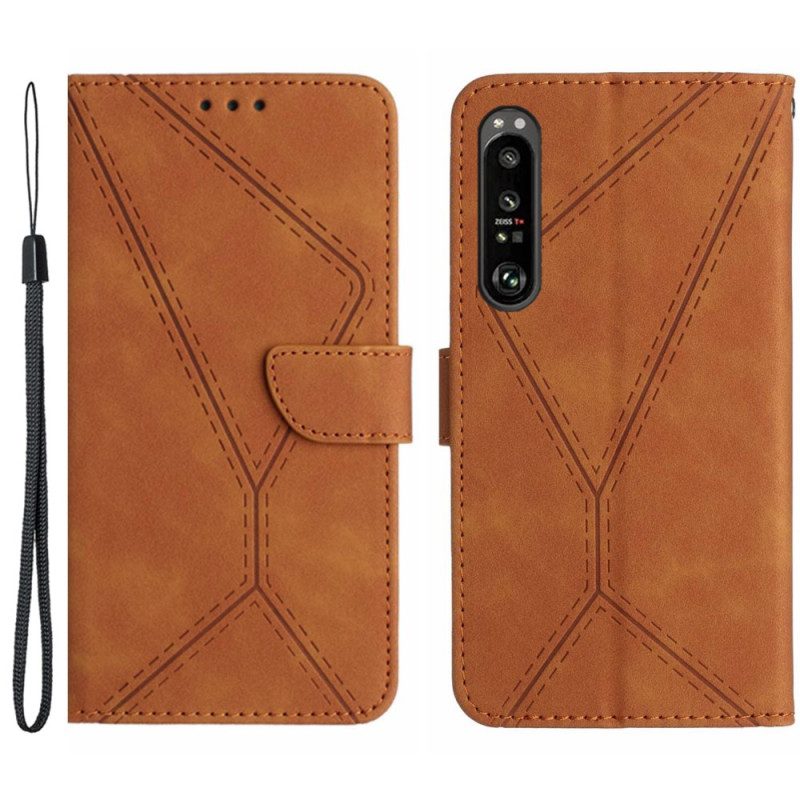 Flip Case Leren Sony Xperia 1 Vi Lijnen En Gestippelde Bandjes